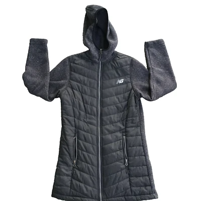 Chaqueta acolchada parcial New Balance para mujer Abrigo de invierno con capucha Negro Talla pequeña Largo Foto 1 de 4