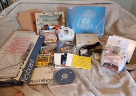 Opened Unused Dreamcast Console Bundle with Sealed Games and Discs Boxed