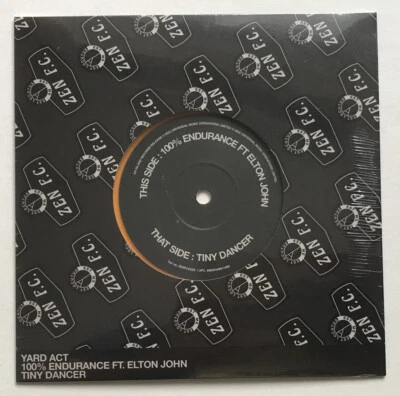 YARD ACT / ELTON JOHN - 100% ENDURANCE - 7" Orange Vinyl - RECORD STORE DAY 2023 - Image 1 of 2