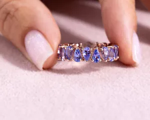 Timeless 5.42 Carat Pear-Shaped Blue Tanzanite Eternity Ring | 14k Rose Gold - Picture 1 of 8