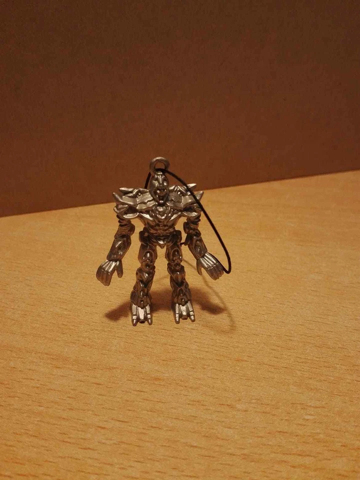 TRANSFORMERS DECEPTICONS MEGATRON CIONDOLO - Immagine 1 di 1