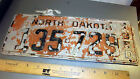 1950 North Dakota Vintage Metal License Plate used to be orange - waffle design