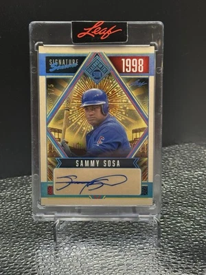 Leaf Seasons In The Sun 2025 Sammy Sosa Signature Season Holo Platinum Auto #1/5 Foto 1 de 4