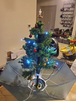 Paper Destiny 30" Snowing Christmas Tree with Umbrella Base Musical Lights - Image 1 of 4