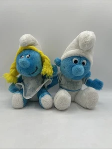 "Lote de peluche Pitufo 1979 y Pitufina 81 Peyo Wallace Berrie de colección 10"" sentado" - Imagen 1 de 24