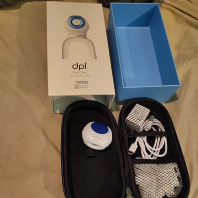 Sistema de terapia de luz para el cuidado bucal DPL dispositivo de blanqueamiento dental con cargador y estuche Foto 1 de 2