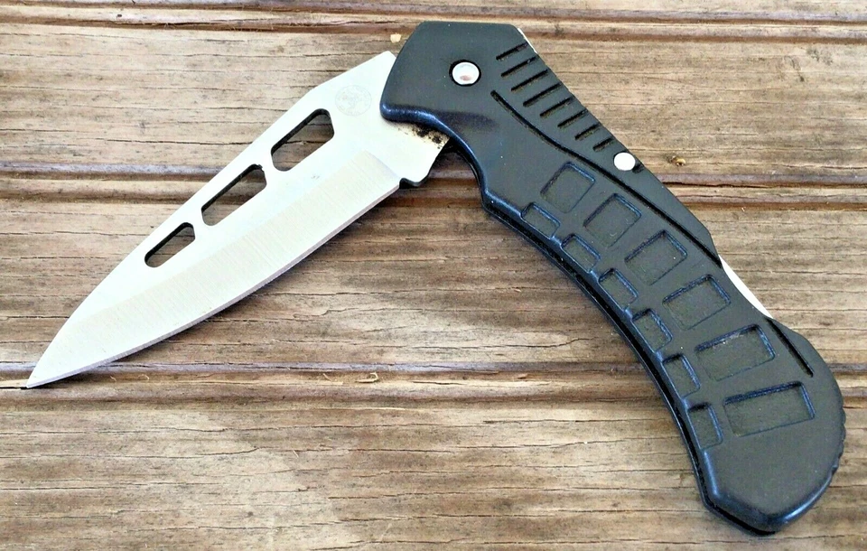 Cuchillo de bolsillo para cubiertos de cola blanca 3" hoja de borde liso negro Foto 1 de 4