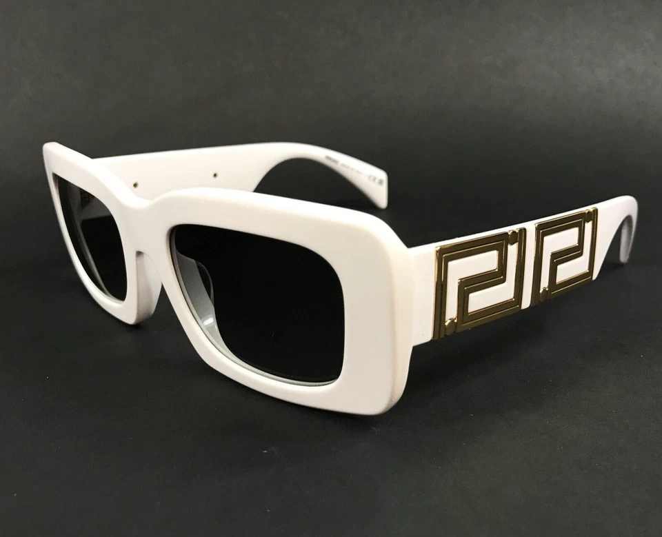 Gafas de sol Versace MOD.4444-U 314/11 gruesas monturas doradas blancas con lentes grises Foto 1 de 4