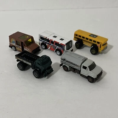 Matchbox Cars Lot Of 5 Trucks 1:64 - Travel Tracker, Pop Art, School Bus & More - Image 1 of 4