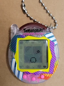Tamagotchi Connect 2023 Ver. Totalmente operativo; requiere restablecimiento de fábrica - Imagen 1 de 3