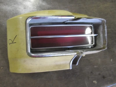 73 74 CUTLASS SUPREME RIGHT TAILLIGHT W/ HOUSING 1/4 EXTENSION NICE LENS OEM - Image 1 of 4