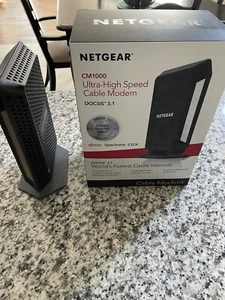 Szybki modem kablowy NETGEAR CM1000-100NAS - Comcast Xfinity Spectrum Cox - Zdjęcie 1 z 4