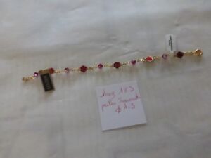 fond de stock bracelet  perle swarovski rouge long 18.5 cm connecteur rouge 7 €