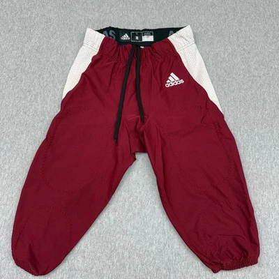 Pantalones de fútbol Adidas tejidos A1 Stock talla mediana borgoña Foto 1 de 4