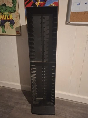 Estante de almacenamiento de torre de cinta vintage Laserline 48 VHS de plástico negro Foto 1 de 4