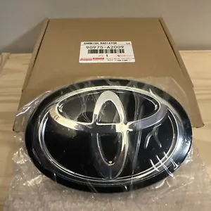 OEM Toyota Front Grille Logo Emblem Radar 90975-02160 C2023 90975-A2009 Black - Picture 1 of 5