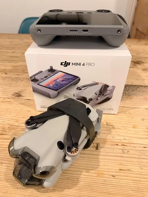 DJI Mini 4 Pro Camera Drone (RC 2 Remote) used twice with 14 months care refresh - Image 1 of 4
