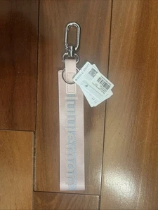 NWT Lululemon Never Lost Keychain Wordmark PIMI / SLVR / Pink Mist / Silver - Picture 1 of 1