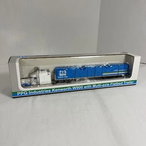 SpecCast 32005 PPG 1:64 Kenworth W900 W/ Multi-axle Flatbed Trailer Die Cast - Picture 1 of 19