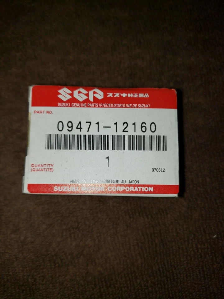 1 NUEVO EN STOCK BOMBILLA FARO ORIGINAL SUZUKI RMX250/DR350/250/DR-Z400 12V/55W -09471-12160 Foto 1 de 1