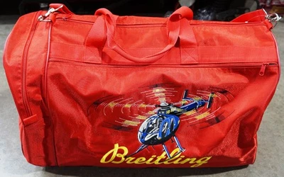 BREITLING WATCHES SWISS CHRONGRAPHS HB-XZO HELICOPTER TRAVEL GEAR RED DUFFEL BAG - Image 1 of 4