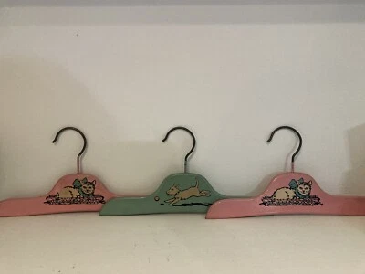 Vtg 1930's Wood Metal Child Clothes Hangers 2-Kitty Cat Basket, 1-Blue Dog Ball - Image 1 of 4