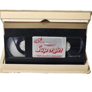 Supergirl VHS (1984 USA Home Video) DC Comics Salkind Blue Clam Shell Case - Imagen 1 de 10