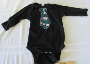 Piel de Conejo Infantil One Piece Eagles NFL Negro 12 Meses (se adapta más pequeño) Snap - Imagen 1 de 4