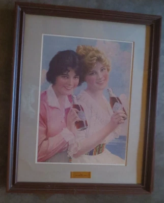 Coca-Cola Company Reproduction of Two Smiling Girls 1912 Framed 12 X 29 inches - Image 1 of 4