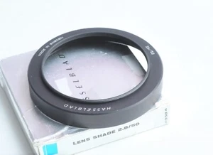 Hasselblad 50 F/2.8 F B70 (86) Gegenlichtblende (40584) Made in Sweden *Neuwertig* Originalverpackt - Bild 1 von 2