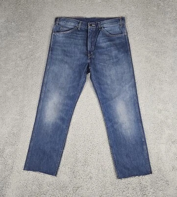 Jeans ajustados Levi's 606 para hombre 38x28 lengüeta naranja dobladillo crudo azul denim Foto 1 de 4