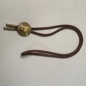 Cravatta bolo lettera iniziale "B" colore oro sunburst marrone boy scout? western - Foto 1 di 4