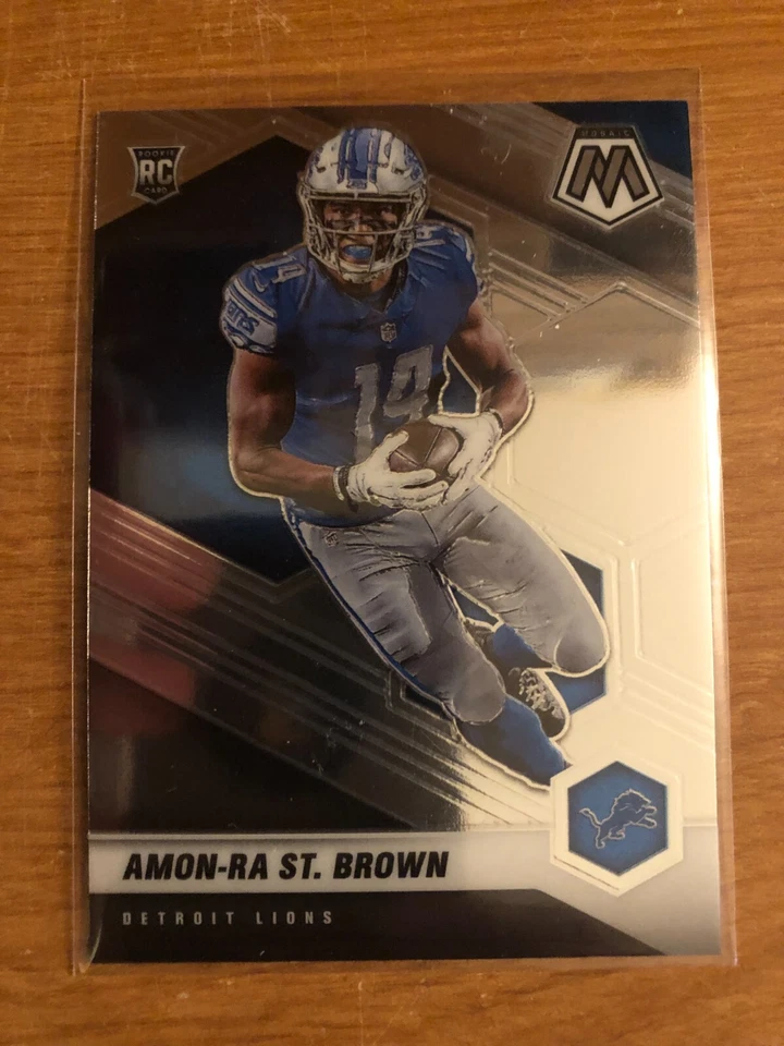 2021 Panini Mosaic Amon-Ra St. Brown RC Detroit Lions USC Trojans - Image 1 of 1