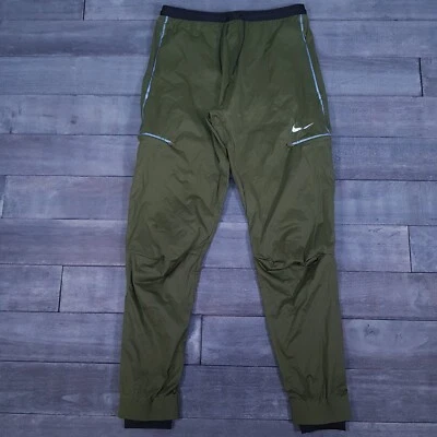 Pantalones de correr NIKE Storm-Fit ADV Run Division para hombre talla PEQUEÑA verde áspero Foto 1 de 4