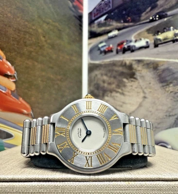 Reloj de vestir Cartier Must De Cartier 21 redondo de acero y oro para dama Foto 1 de 4