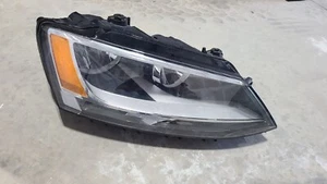 Headlight Assembly Front Right Hella 010131061 oem vw jetta 2011-15 - Picture 1 of 6