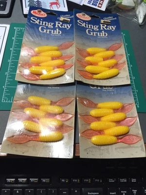 (4) ВИНТАЖНЫЕ СНЯТЫЕ С ПРОИЗВОДСТВА MANN'S STING RAY GRUB (6 КАРАТ) EA В УПАКОВКЕ.  NIPS СДЕЛАНО В США - Изображение 1 из 3