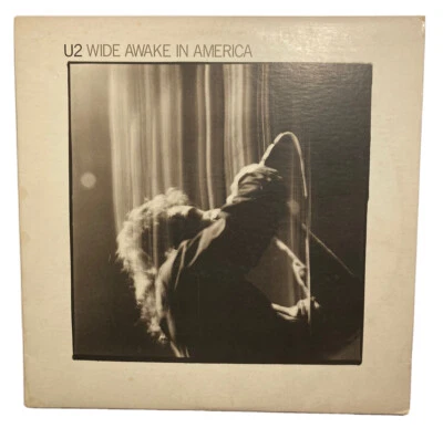 U2 “Wide Awake In America” 1985 EP  4 Track Vinyl 33RPM Island 90279-1-A     VG+ - Image 1 of 4
