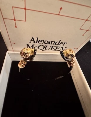 Suporte de mão vintage de Alexander McQueen caveira tom preto e dourado - Imagem 1 de 4