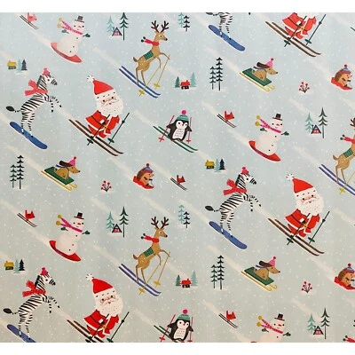 Hallmark Wrapping Paper Christmas Santa's Ski Team Reversible 40 sq ft Roll - Image 1 of 3