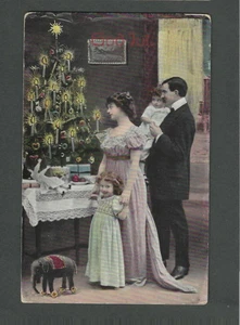 1914 Real Photo Post Card Couple Celebrating Christmas W/Family - Picture 1 of 1