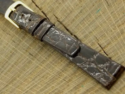 Correa de reloj vintage Stylecraft NOS cocodrilo marrón sin usar con hebilla tono dorado 13 mm Foto 1 de 4