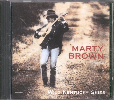 Marty Brown Wild Kentucky Skies CD USA MCA 1993 CD. Hat Ein Loch Durchgebohrt - Bild 1 von 3
