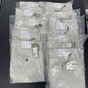RESALE LOT of 10 Men's Skinny Chino Pants 32x30 Ivory NWT Stretch Comfort - Picture 1 of 3