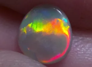 0.72ct Solid Lightning Ridge dark opal, stunning cat eyes pattern & rainbow fire - Bild 1 von 13