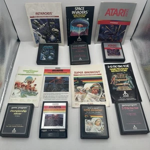 Atari 2600 Lot 7 Games With Manuals Asteroids Phoenix Atlantis Super Breakout - Picture 1 of 15