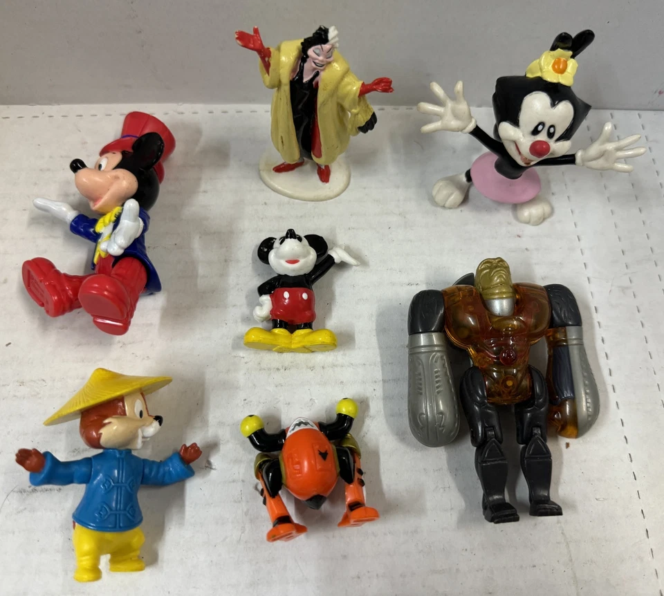 Lote de 7 Figuras de Acción Disney Mickey Mouse Punto Galoob Jawbreaker Optimus Primal Foto 1 de 4