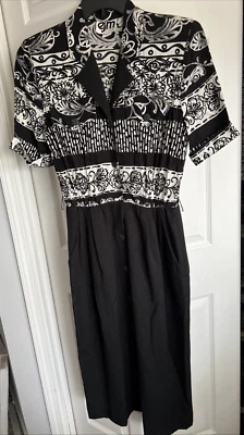 VESTIDO VINTAGE EJM NEGRO/BLANCO BOTÓN DELANTERO BOLSILLOS LATERALES CUELLO RAYÓN/POLIÉSTER Foto 1 de 4