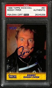 "Rowdy" Roddy Piper 1988 Topps WCW/nWO #67 Signed Card PSA/DNA Encapsulated - Picture 1 of 3