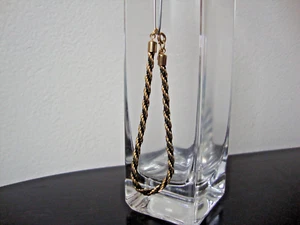 VINTAGE HONGKONG COOL! GEFLOCHTENES SCHWARZ & GOLDGARN 7" ARMBAND GOLDFARBEN VERSCHLUSS - Bild 1 von 3